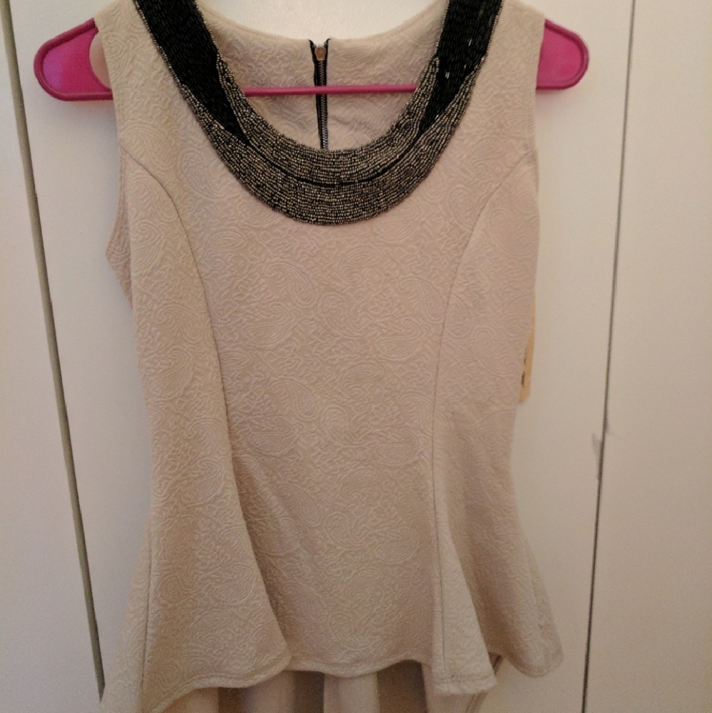 Brand new peplum top