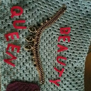 Gold and black necklace