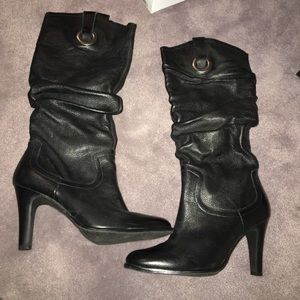 Black leather boots with 3 inch heel. Size 7.5