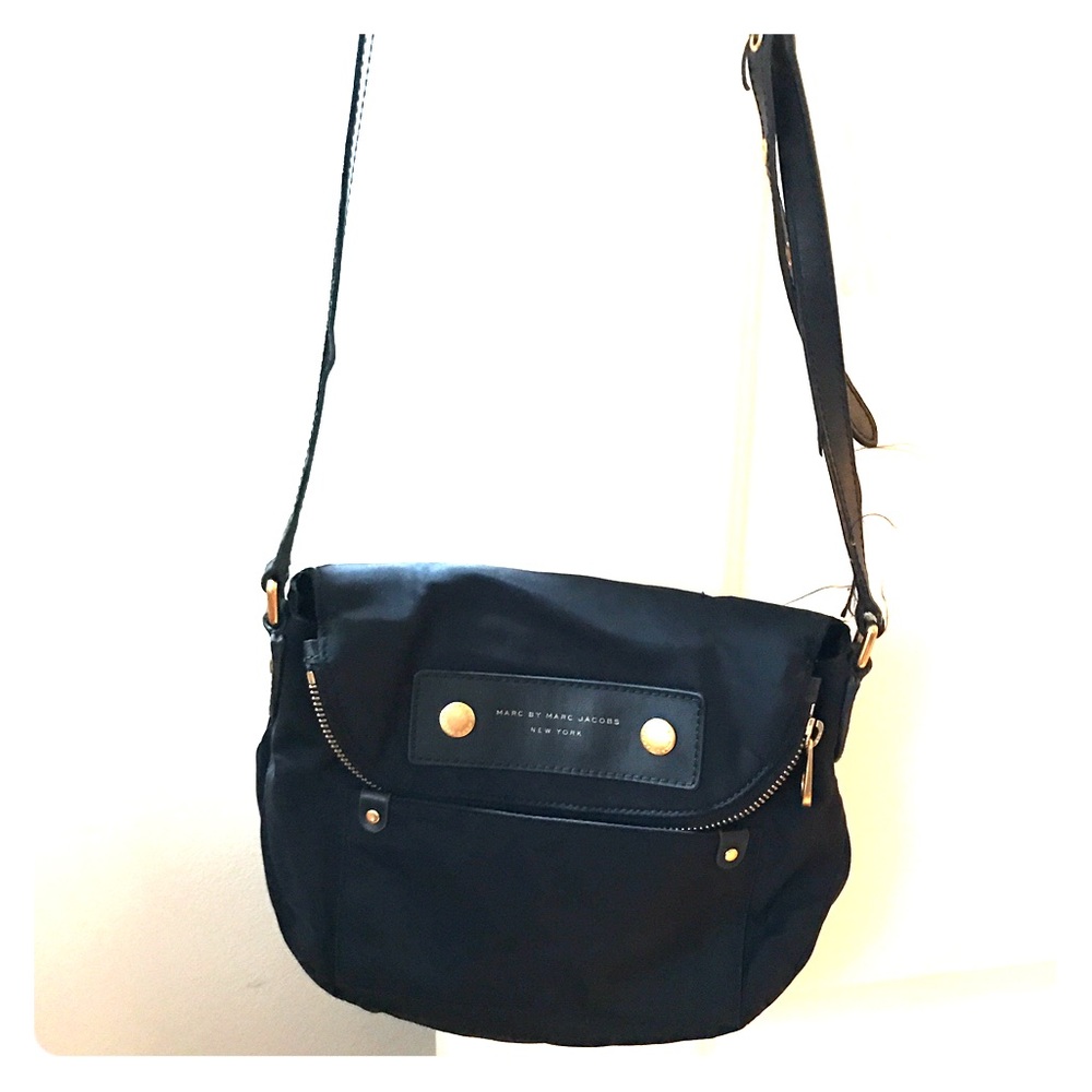 Marc Jacobs Crossbody bag. Black with gold writing