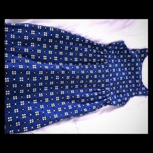 Sleeveless dress with pockets.  Cotton.