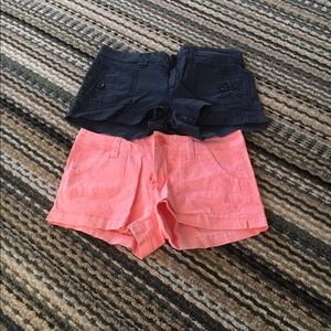 Navy blue is size 6       Pink is size 9