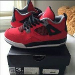 Red Jordan 4's