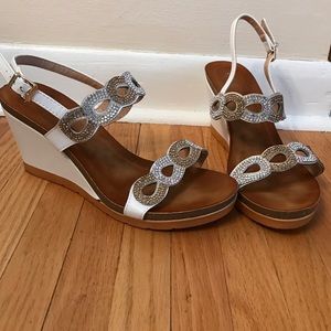 Rhinestone detailed wedge sandals.