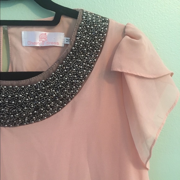 Pretty pink blouse with beaded neckline. - Picture 2 of 3