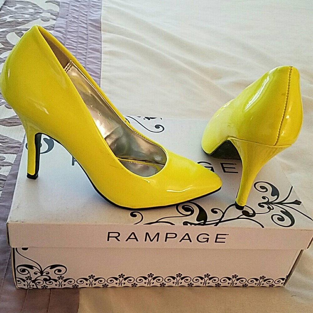 Neon yellow patent leather heels