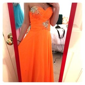 Bright orange prom gown