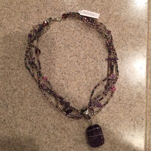Purple beaded necklace with adjustable clasp