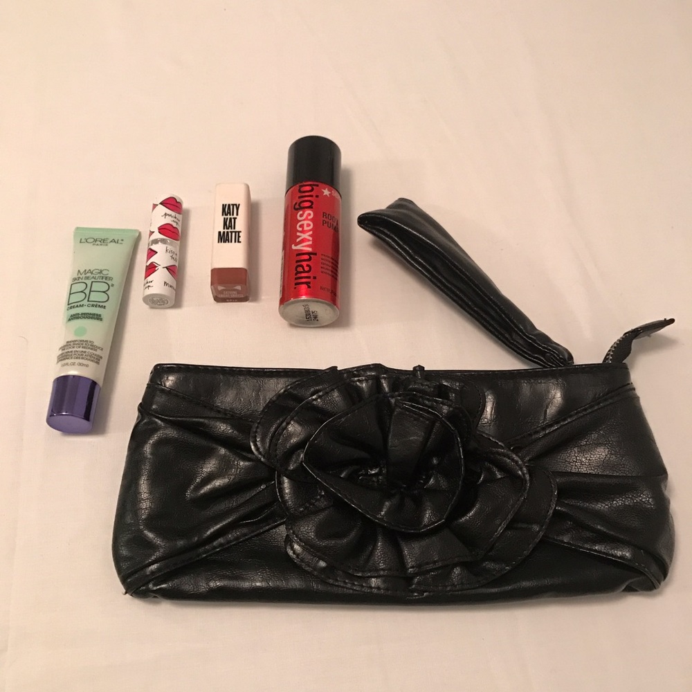 Black clutch with rosette detail
