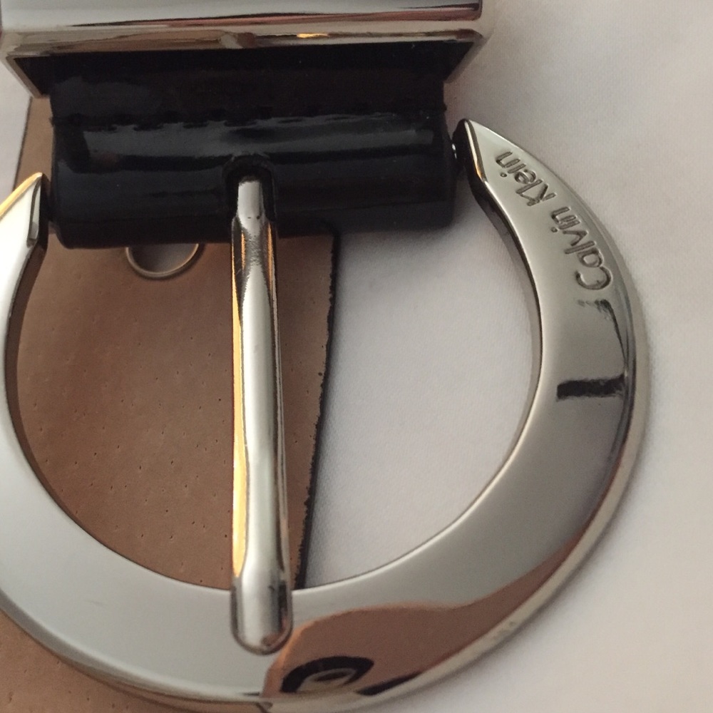 Never worn shiny Calvin Klein black belt