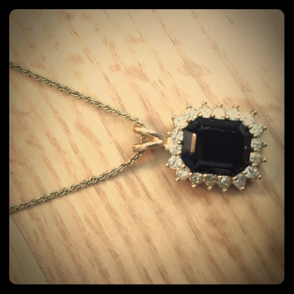 Gold necklace with black stone