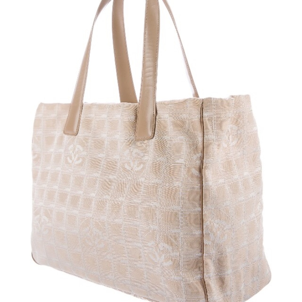SOLD.    Chanel Travel Tote