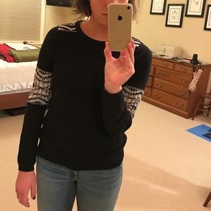 Black knit sweater with white accent