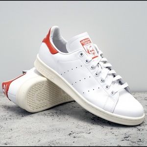 Red and white adidas Stan smiths