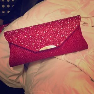 red sparkly clutch