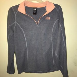A grey The North Face pullover