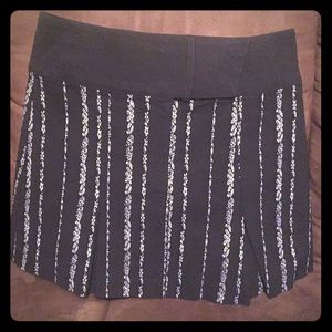 Bebe black pleated mini skirt