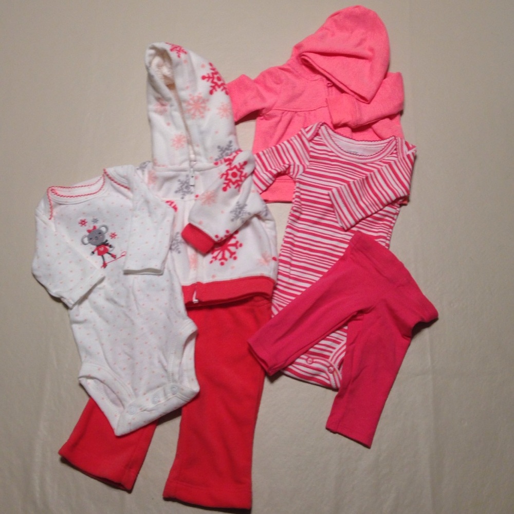 Bundle of never worn newborn clothes