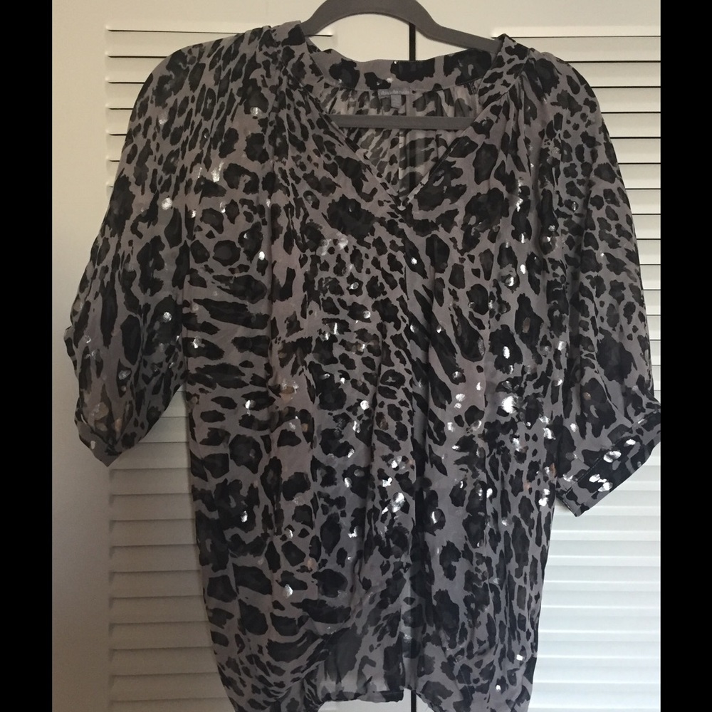 Metallic leopard print tunic shirt.