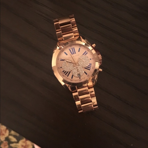 Michael Kors gold-rose watch with diamonds.
