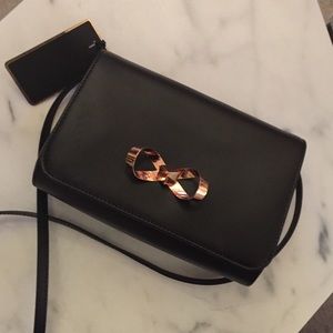 New and tagged Beautiful cross body purse/ bag