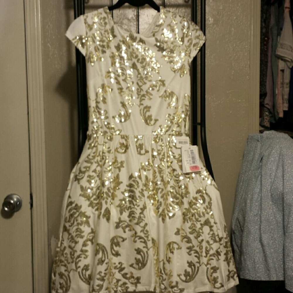 Junior's cream sateen formal dress with sheer back