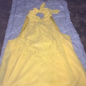Yellow Dressy sleeveless blouse