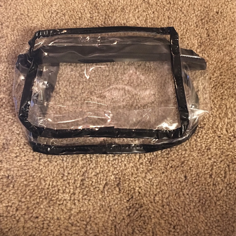 6.5 inches in width 5 inches in height. Clear bag.