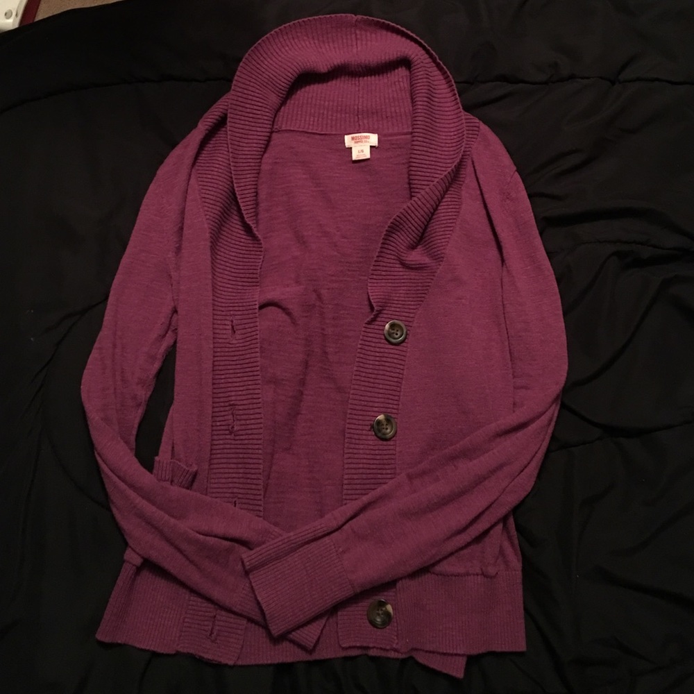 Purple cardigan.