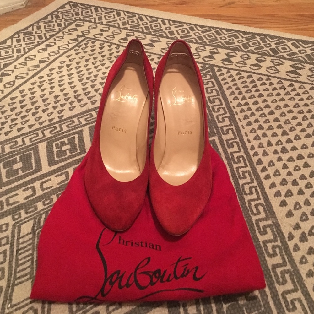 Christian Louboutin red suede pumps