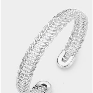 Metal wire coil cuff bracelet