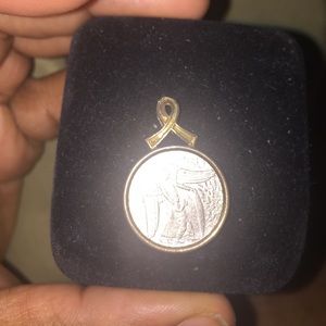 Angel coin pendant