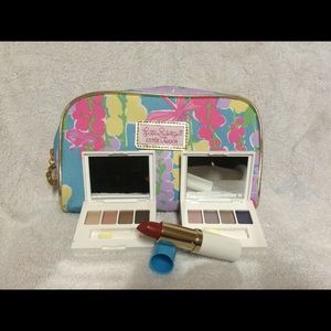 Estée Lauder eyeshadows with make up bag