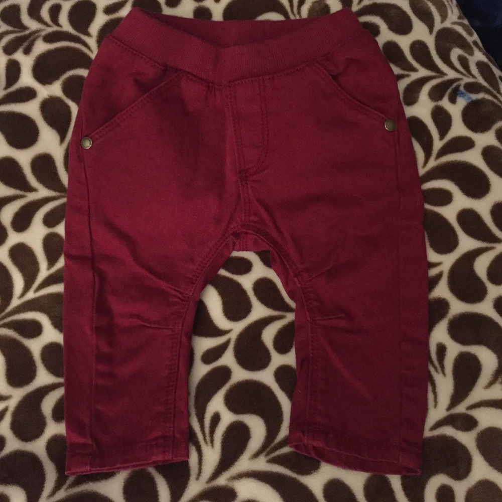 IMPS & ELFS red pants. 6-9 mos. Worn 1 time!!