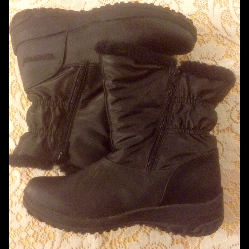 Weatherproof black boots.
