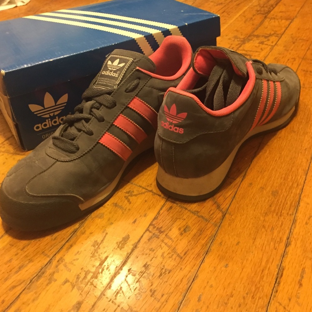 Grey and neon pink Adidas Samoas
