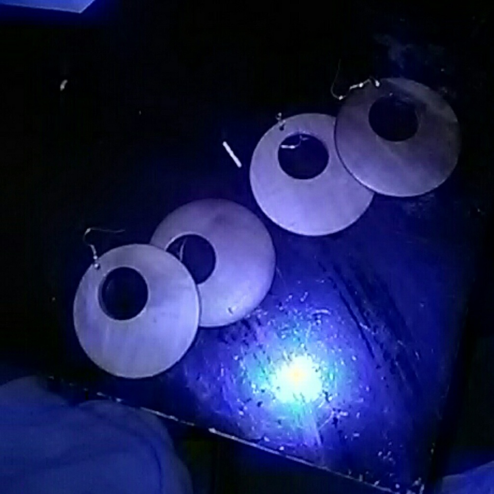 2 pair wooden hoop earrinsize compared to relative