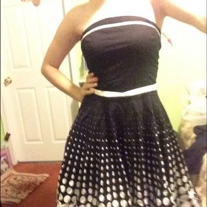 Ruby Rock Dillard's dress.