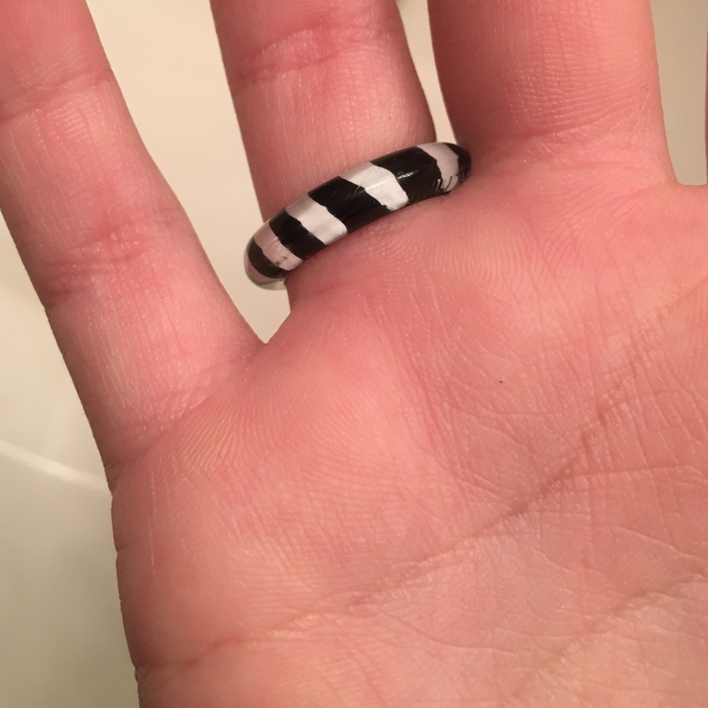 white and black ring