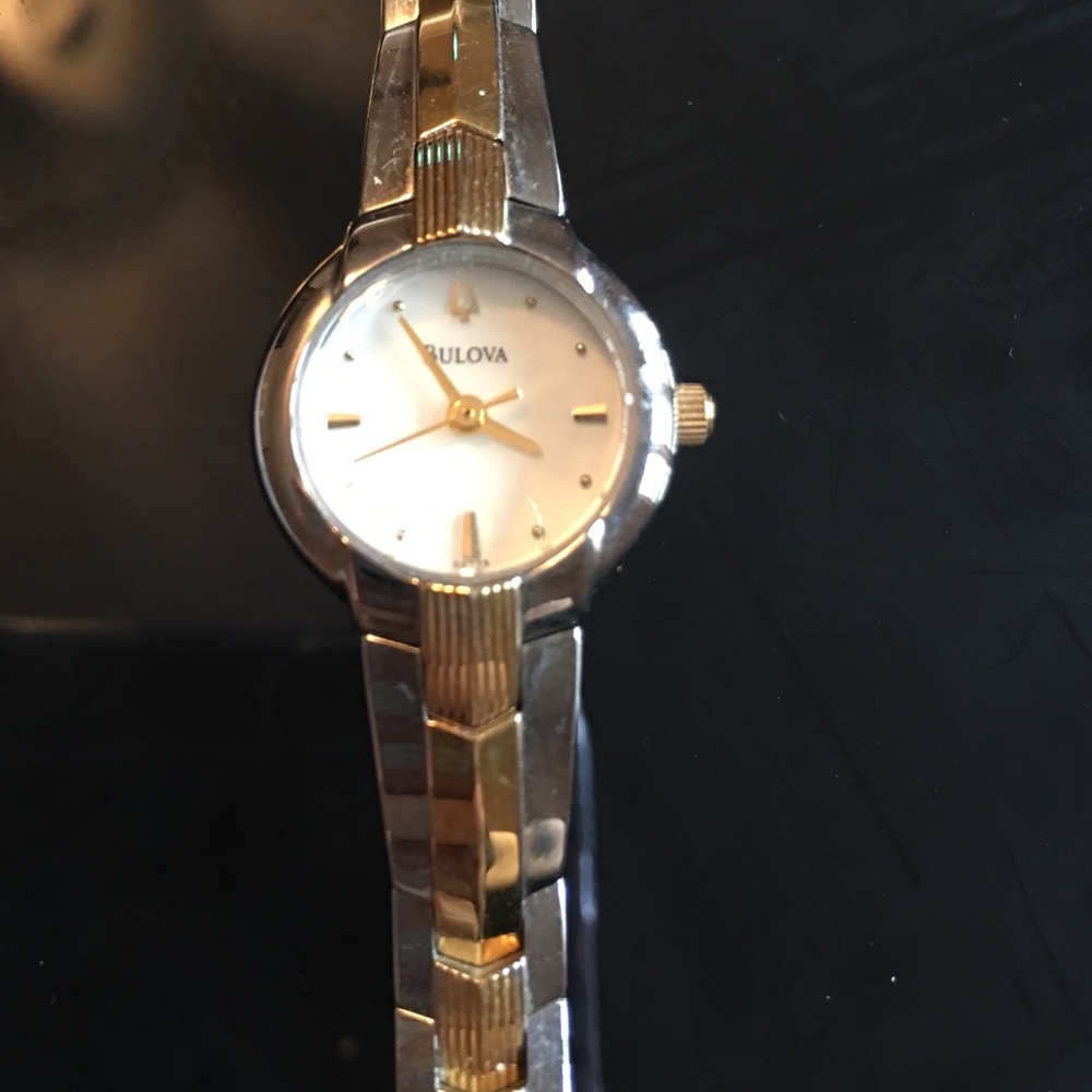 Bulova ladies watch. White face, stainless / gold