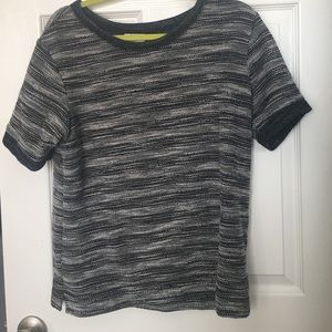 A black/white ribbed top.