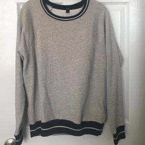 Oatmeal grey sweatshirt.