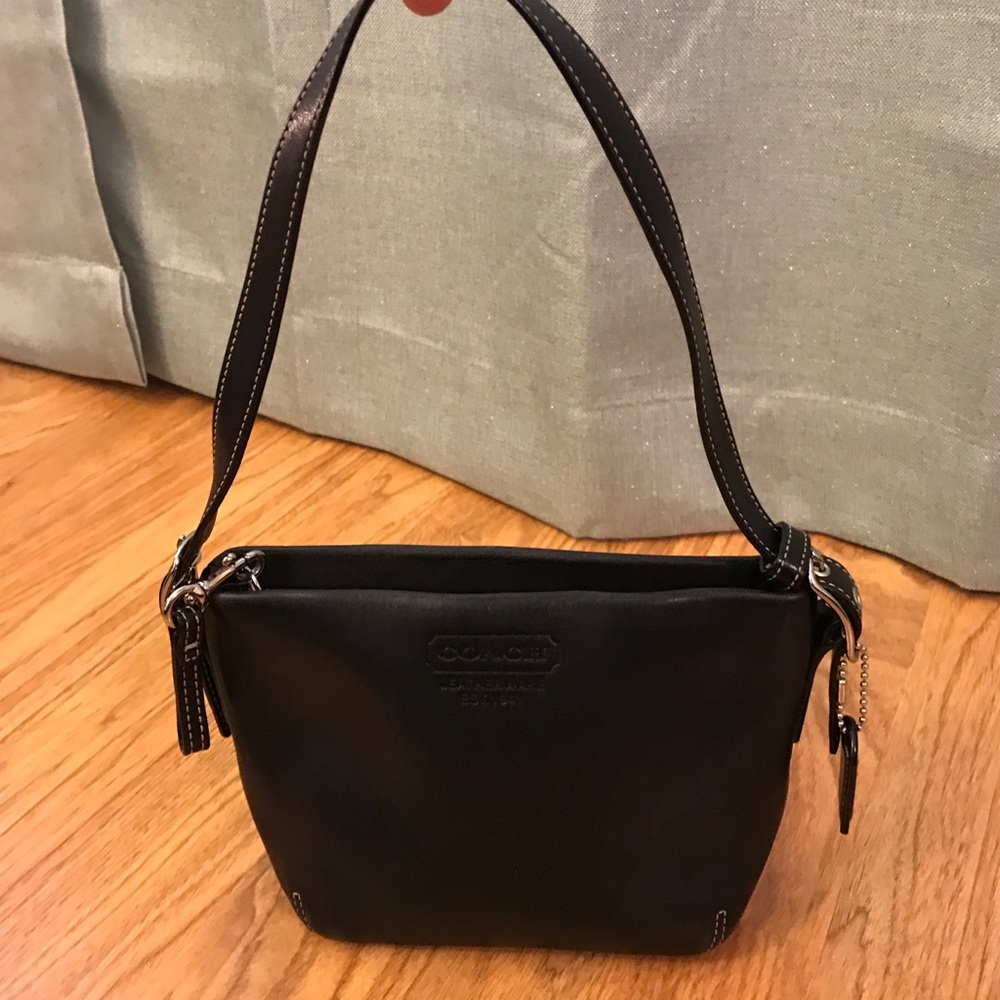 Coach black mini shoulder bag.