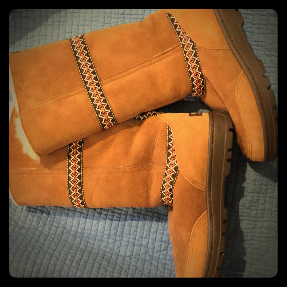 NWOT Authentic UGG Boots.  Never worn and so cute!