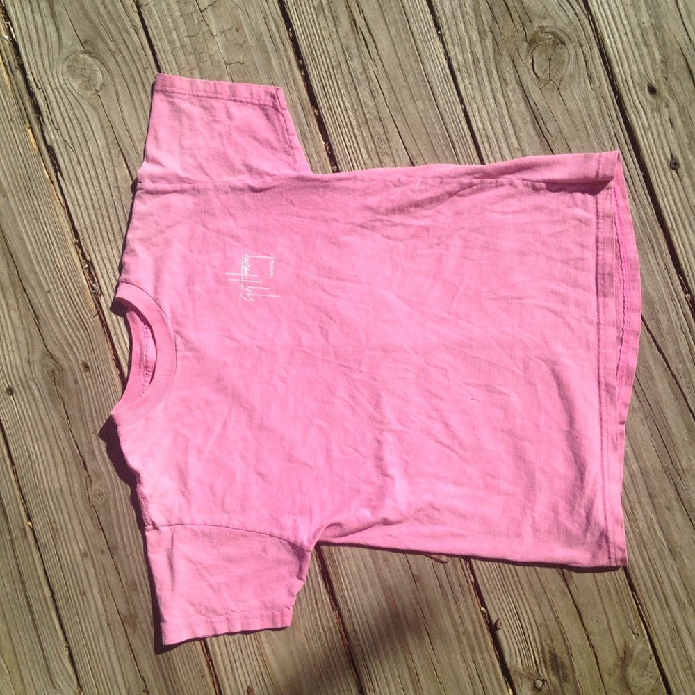 Pink guy Harvey shirt with picture on back.