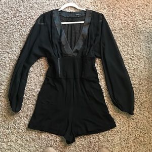 Bebe black romper. RESERVED FOR Hayebabey