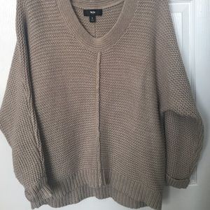 An oatmeal sparkly sweater.