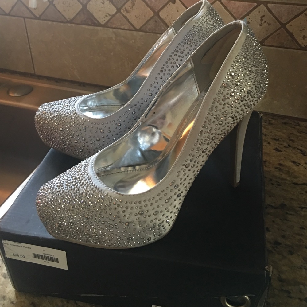 Silver rhinestone pumps