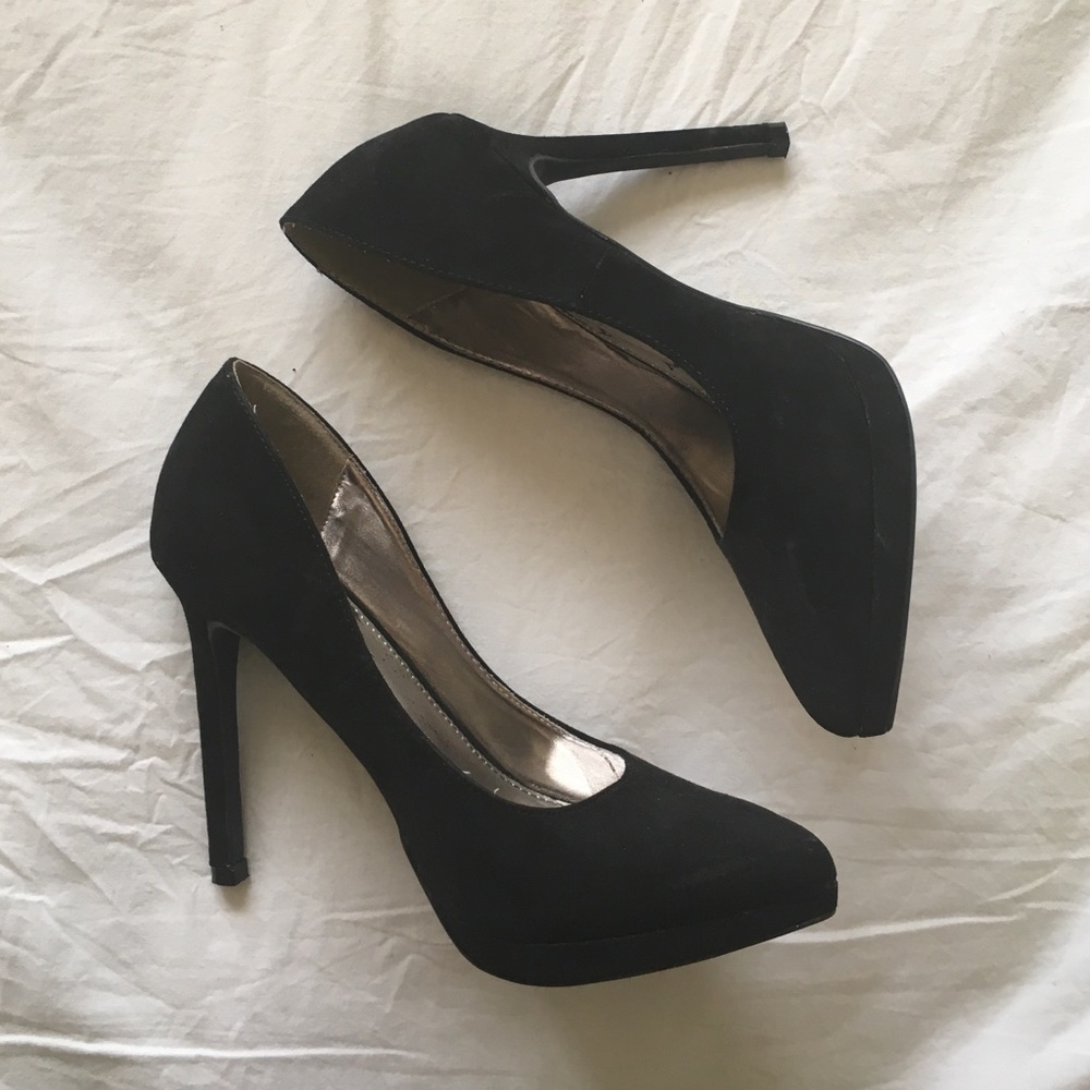 REPORT BLACK HEELS