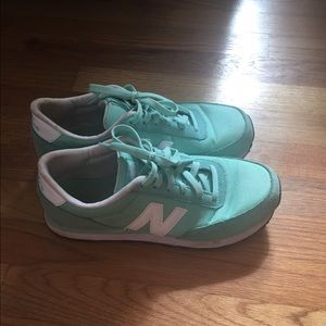 mint green 501 new balance trainers
